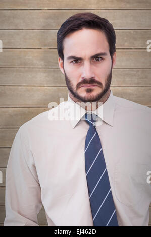 Zusammengesetztes Bild Porträt von einem wütenden Geschäftsmann Stockfoto