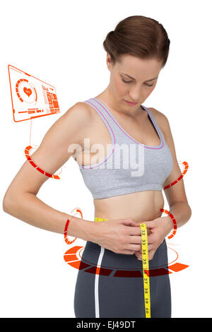 Zusammengesetztes Bild Porträt einer Fit Frau messen Taille Stockfoto
