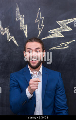 Charismatische schön fangen eine glänzende Idee Stockfoto