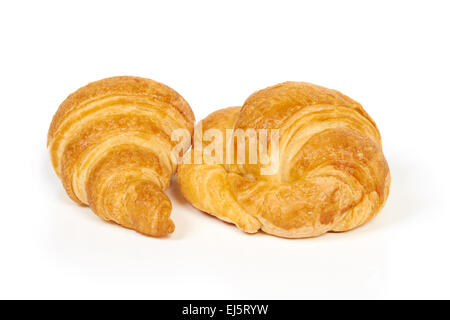 Zwei frische und leckere Croissants, isoliert auf weiss Stockfoto