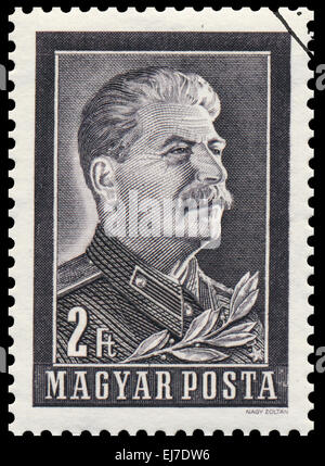 Ungarn, gedruckt ca. 1953 - Stempel in Ungarn mit einem Stalin-Porträt und das Datum seines Todes, ca. 1950er-Jahre. Stockfoto