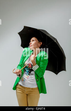 Mädchen mit Regenschirm Stockfoto