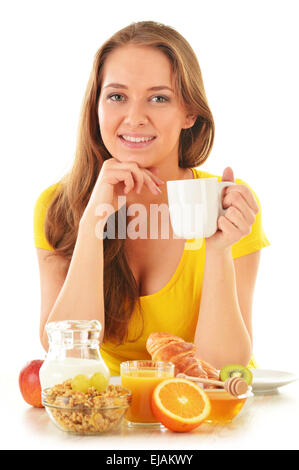 Junge Frau beim Frühstück. Ausgewogene Ernährung Stockfoto