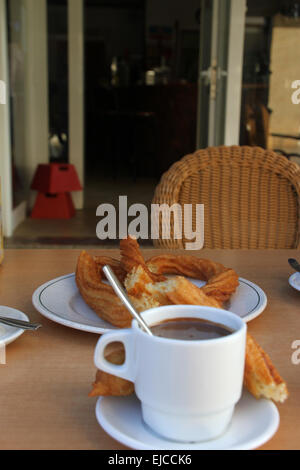 Churros con Chocolate Stockfoto