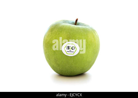 Grüner Apfel mit Bio-Siegel Stockfoto