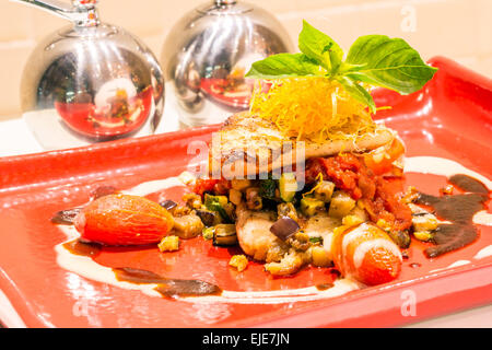 würzen Sie gegrillten Fisch Filetstücke Stockfoto