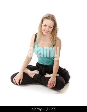 Junge Frau im fortgeschrittenen Yoga-Pose, isoliert auf weißem Hintergrund sitzen Stockfoto