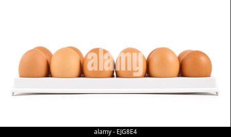 Dutzend Eier in einem Fall isoliert Stockfoto