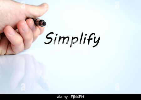 Menschliche Hand schreiben Simplify isoliert auf weißem Hintergrund - Business-Konzept Stockfoto