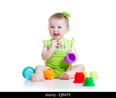 kleine Mädchen spielen mit Spielzeug Stockfoto