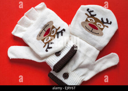 Festliche rentier Design fingerlose handschuhe mit Klappe auf rotem Hintergrund einstellen Stockfoto