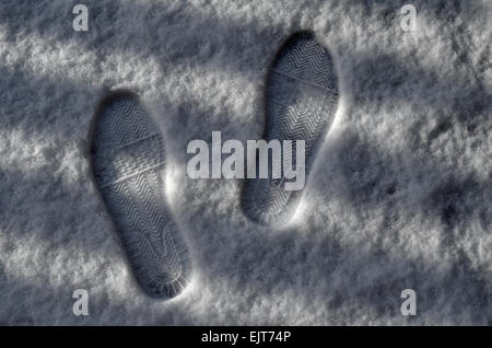 Fußspuren im Schnee Stockfoto