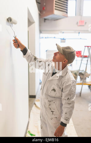 Arbeiter Malerei Wand Stockfoto