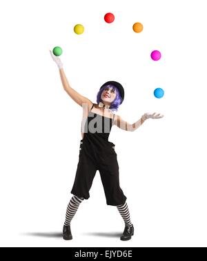 Clown wie einen Jongleur Stockfoto