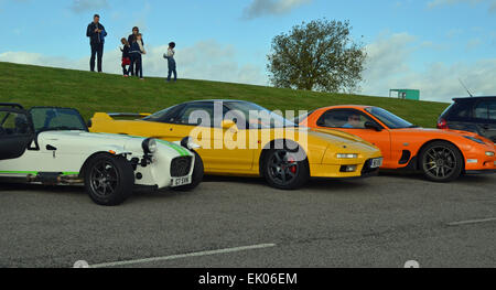 Weiße Caterham 7 gelbe Honda NSX Orange Mazda RX7 Stockfoto