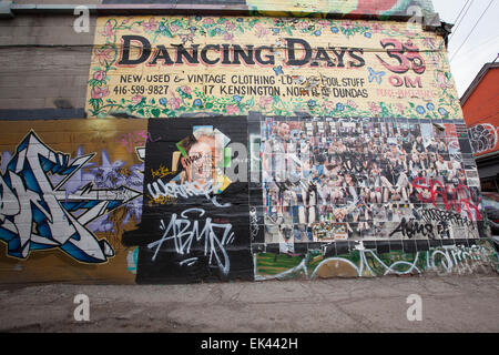 TORONTO - 2. April 2015: Grafitti ausgekleidet Gebäude in Kensington Gasse. Kensington Market ist eine multikulturelle Nachbarschaft in der Stockfoto