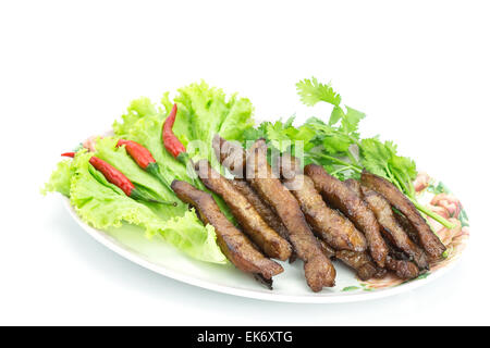 Gebratenes Schweinefleisch, Thai-Küche serviert mit Gemüse isoliert auf weißem Hintergrund Stockfoto
