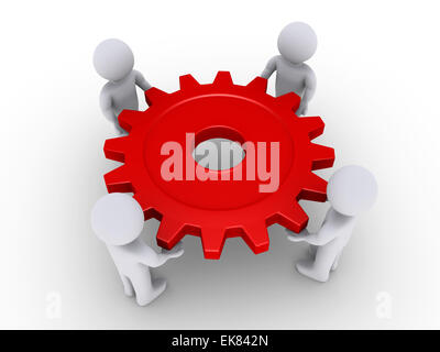 Vier Leute halten Zahnrad Stockfoto