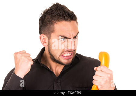 Closeup Portrait von schöner hispanic Mann reden auf Retro-Telefon mit Schnur Stockfoto