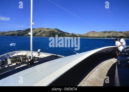 Kreuzfahrt-Passagiere an Bord einer blauen Lagune Kreuzfahrt. Yasawwa Inseln. Fidschi-Inseln. Süd Pazifik Stockfoto