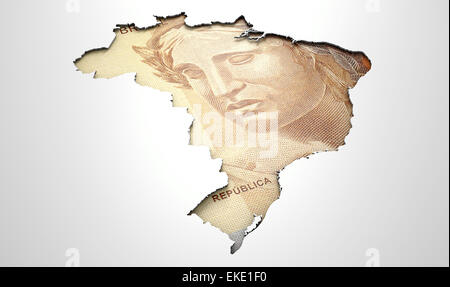 Die Form des Landes von Brasilien in den Farben ihrer Landeswährung real in eine isolierte weiße Oberfläche eingelassen Stockfoto