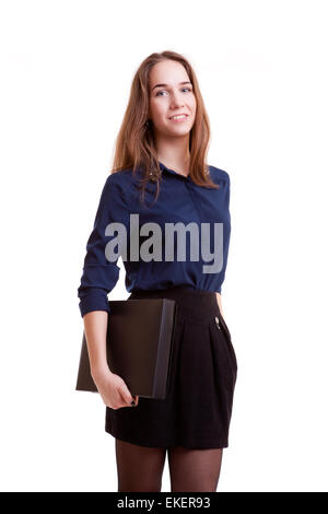 Junge Studentin mit Ordner in der Hand isoliert auf weißem Hintergrund. Studio Aufnahmen. Schule und Erfolg im Studium Stockfoto