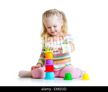 kleine Mädchen spielen mit Spielzeug Stockfoto