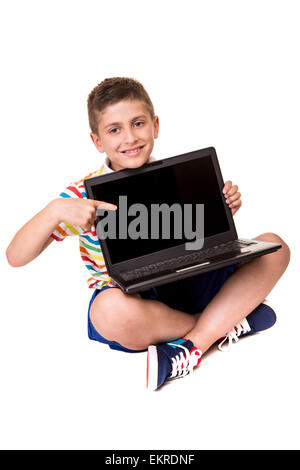 Süße blonde junge mit einem Personal computer Stockfoto