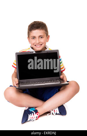 Süße blonde junge mit einem Personal computer Stockfoto