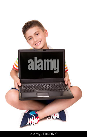 Süße blonde junge mit einem Personal computer Stockfoto