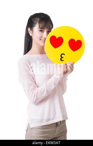 Junge Frau mit einer romantischen Emoticon-Gesicht Stockfoto