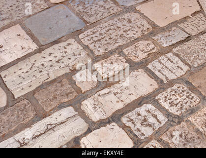 Alte Straße Fliese Hintergrund closeup Stockfoto