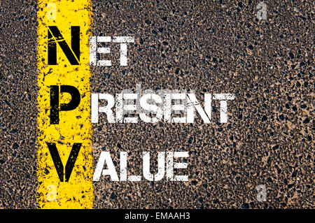 Business Acronym NPV - Net Present Value. Yellow paint line on the road against asphalt background. Conceptual image Stockfoto