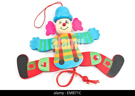 Mechanische Clown Spielzeug auf Zeichenfolge isoliert auf weiss Stockfoto