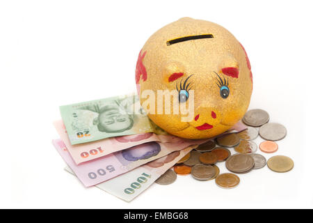 Sparschwein mit Münzen und Banknoten Stockfoto