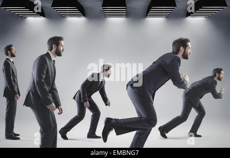 Konzeptionelle Foto der laufenden Geschäftsleute Stockfoto