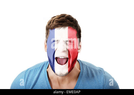 Schreienden Mann mit Frankreich Flagge auf Gesicht. Stockfoto