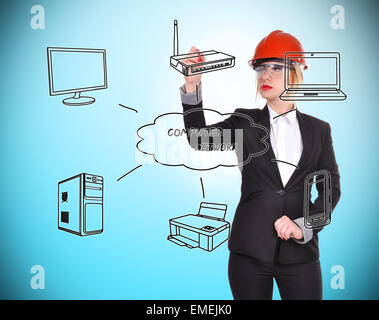 Ingenieur-Frau zeichnen Computernetzwerk auf blauem Hintergrund Stockfoto