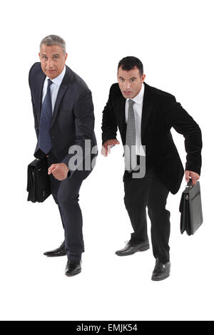 Zwei Geschäftsleute Rennen einander Stockfoto