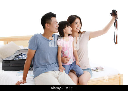 Das Glück einer Familie von drei auf dem Foto Stockfoto