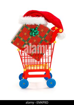 Warenkorb mit großen Weihnachten vorhanden, Weihnachtsmütze auf der Box Spielzeug Stockfoto
