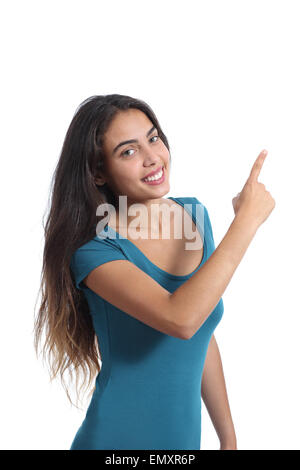 Glückliche Veranstalter Teengirl präsentieren und deutete auf Seite isoliert auf weißem Hintergrund Stockfoto