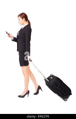 Geschäftsfrau, die Reisen mit Koffer isoliert Stockfoto