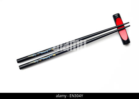 Hochauflösendes Bild schwarze hölzerne Stäbchen mit Ess-Stäbchen Rest. Stockfoto