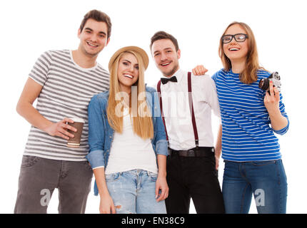 Vier stilvolle junge Menschen auf weißem Hintergrund Stockfoto