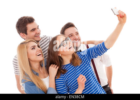 Vier stilvolle junge Menschen auf weißem Hintergrund Stockfoto