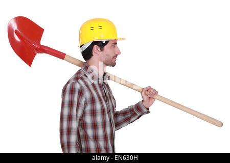 Arbeiter mit einem Spaten Stockfoto