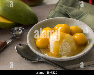Mango-Jubiläum flambe Stockfoto