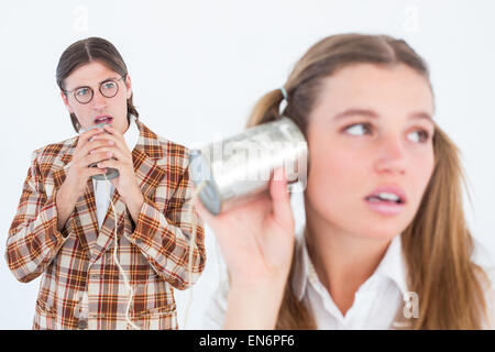Geeky Hipster mit Schnur-Telefon Stockfoto