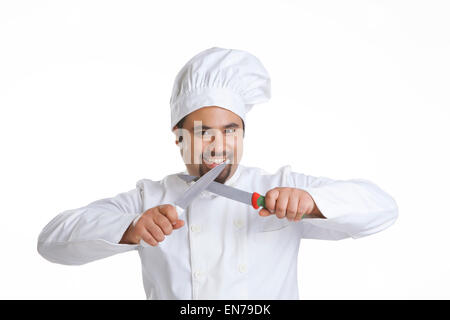 Porträt von Koch Messer schärfen Stockfoto